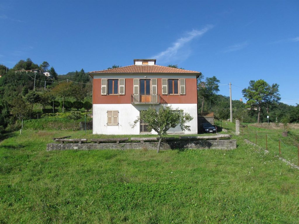 Detached property with barn and land
